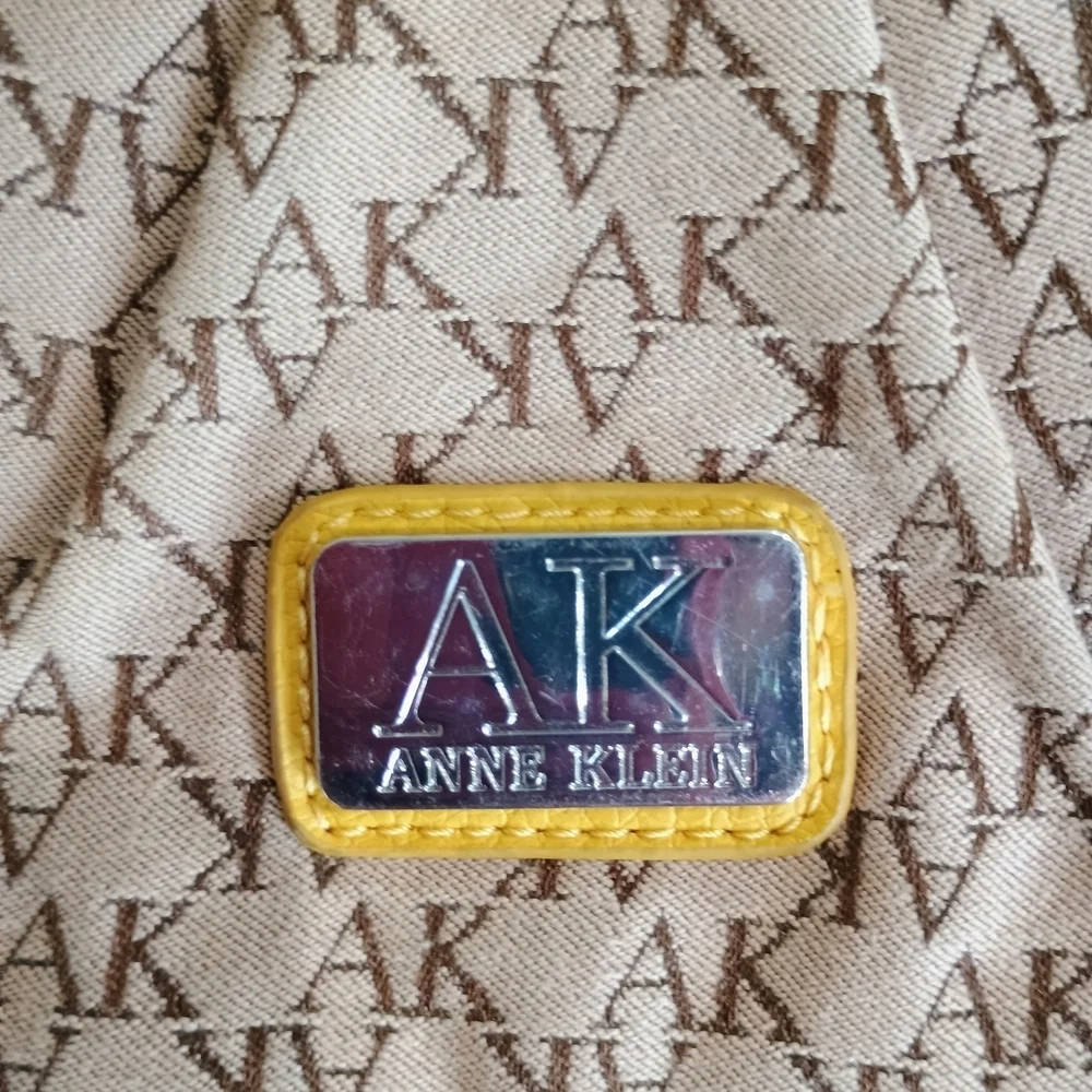 Anne Klein Yellow and Cream Wristlet with Textured Design